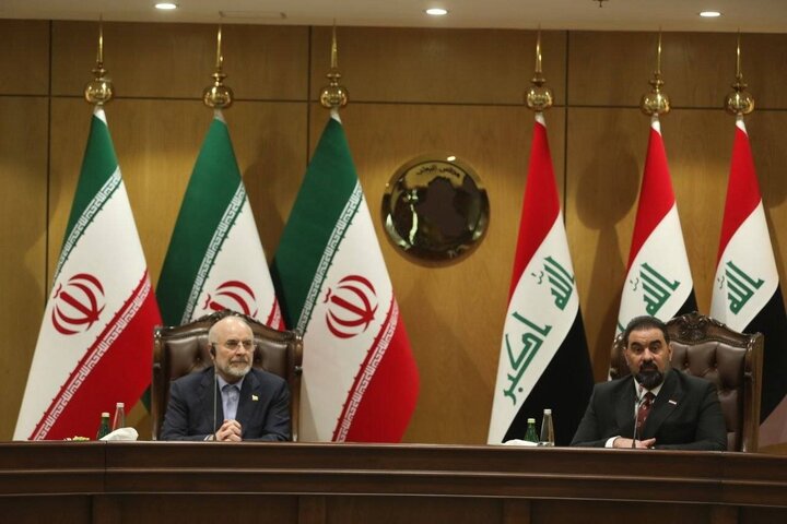 دیدار قالیباف و الحلبوسی در بغداد / تبادل هدایای یادبود میان روسای مجالس ایران و عراق